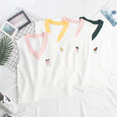 4 styles in white with small embroidered fruits (banana, strawberry, peach, and watermelon) on the top right for a cute, playful touch.