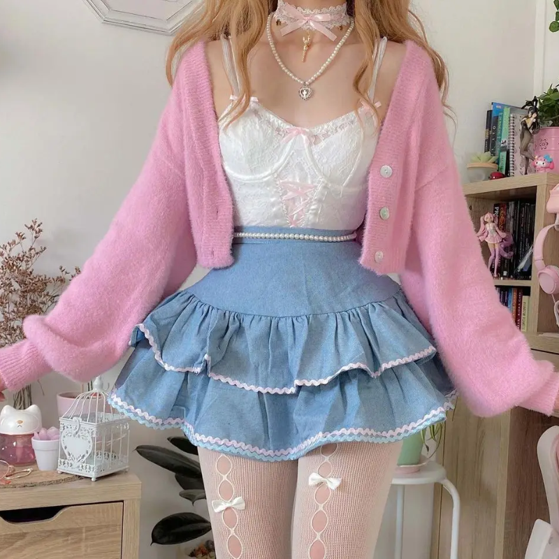 Model wearing a kawaii high waist denim skirt in pastel outfit, front view