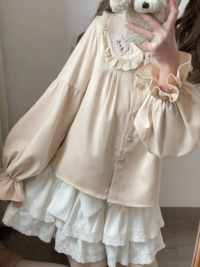 Kawaii Teddy Bear Blouse with long puffed sleeves, featuring adorable teddy bear face buttons for a cute and playful touch.
