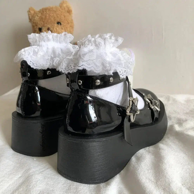 Rear view of the Mary Jane shoes with platform and star-shaped buckle, highlighting the 5 cm (1.9 inches) heel, adding elegance and comfort to the design.