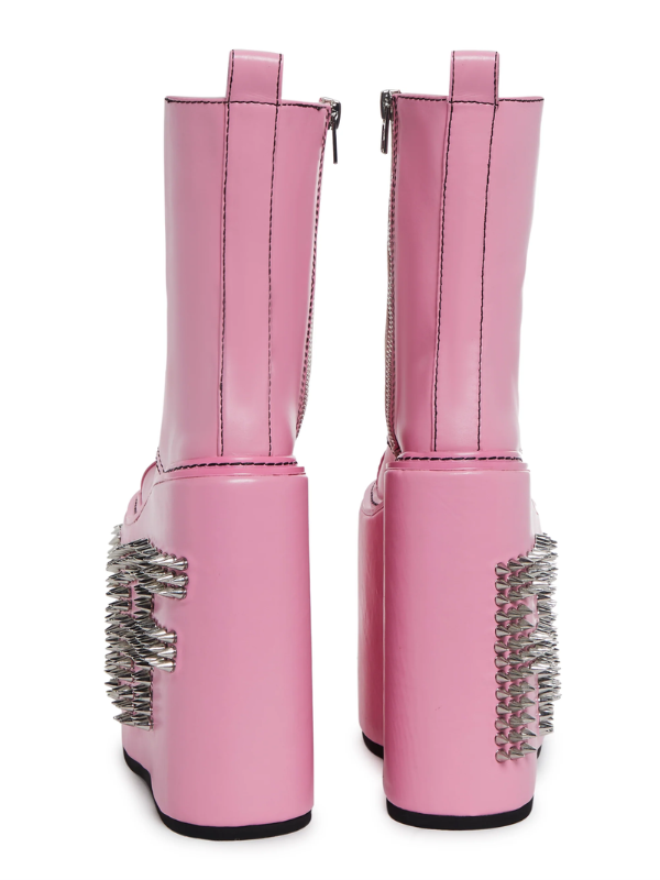 Pink Never Censored Platform Boots with pink laces and a side zipper, featuring chunky platform soles for a bold and stylish look.