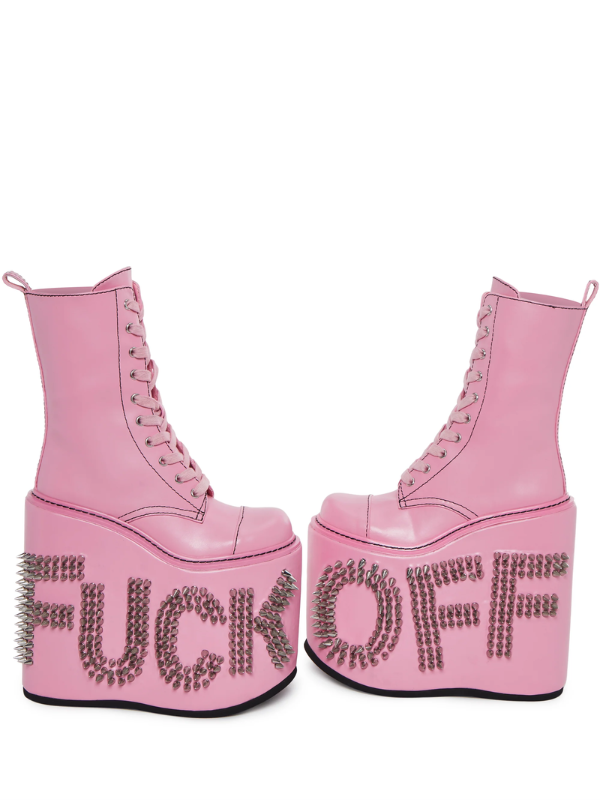 Pink Never Censored Platform Boots with pink laces, side zipper, and spiked studs on the sides that read "FUCK" and "OFF," adding an edgy and rebellious touch.