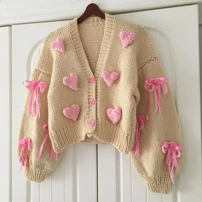 Kawaii cardigan with buttons and pink heart details