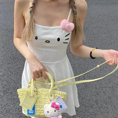 White dress with fixed straps, featuring a delicate pink bow, adding a romantic and cute touch to the design.