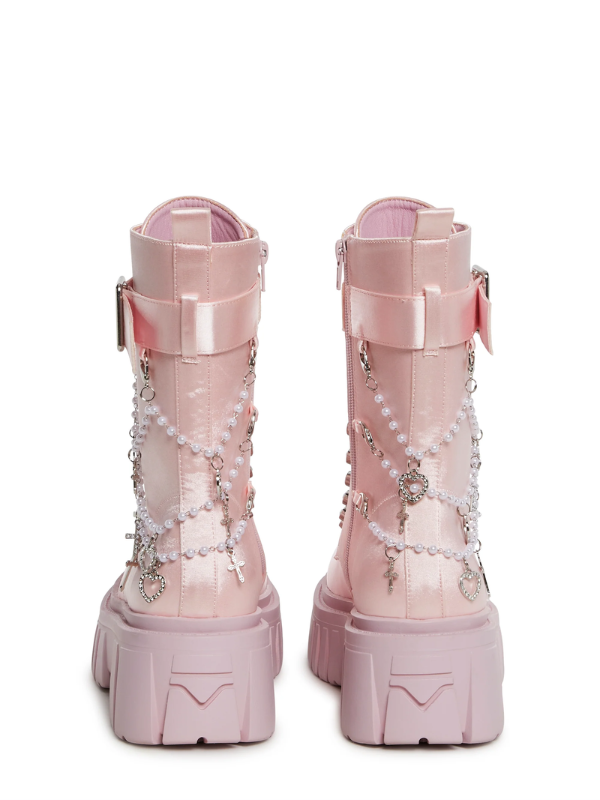 Angelcore Mayhem Boots back view: light pink satin finish with chunky heels, ribbon laces, and removable cross and heart charm straps.