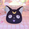 Cup mat inspired by Luna, Sailor Moon's cat, featuring a cute design with dark purple tones, crescent moons, and Luna's iconic features. The mat captures Luna’s playful and magical essence