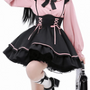 Black Ruffled Suspender Skirt with straps, featuring a cute and stylish design with playful ruffles for a chic, edgy look.