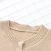 Cartoon knit cardigan with round neckline, playful designs and front pockets.