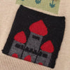 Cartoon knit cardigan with playful designs and front illustrated pockets.