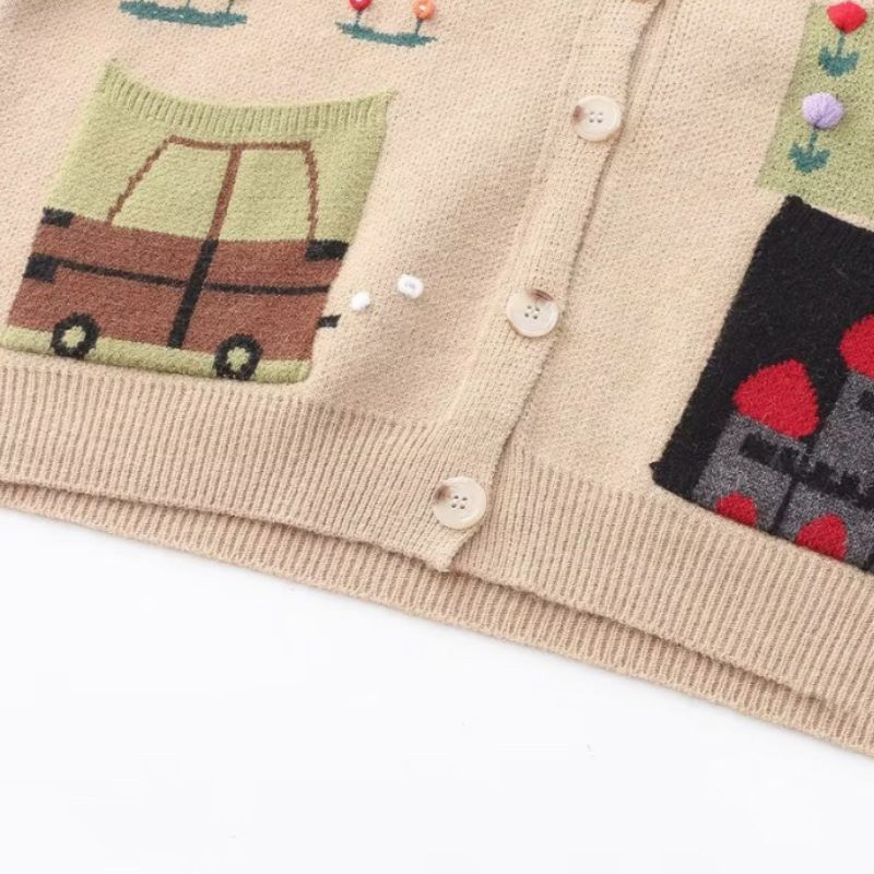Soft knit cardigan with whimsical playful drawings, Harajuku style.