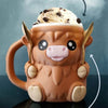 Ice cream pint insulator in the shape of a fluffy Highland cow.
