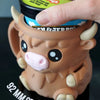 Kawaii Highland cow pint sleeve keeping ice cream cold and hands warm.