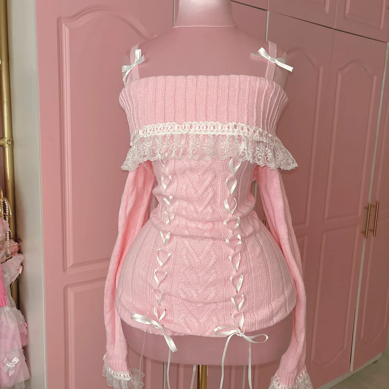 Elegant pink sweater with delicate details, available in S, M, and L.