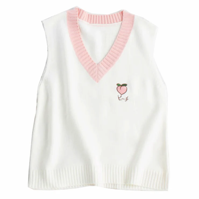 White vest with a cute embroidered peach on the top right, adding a sweet and charming touch.