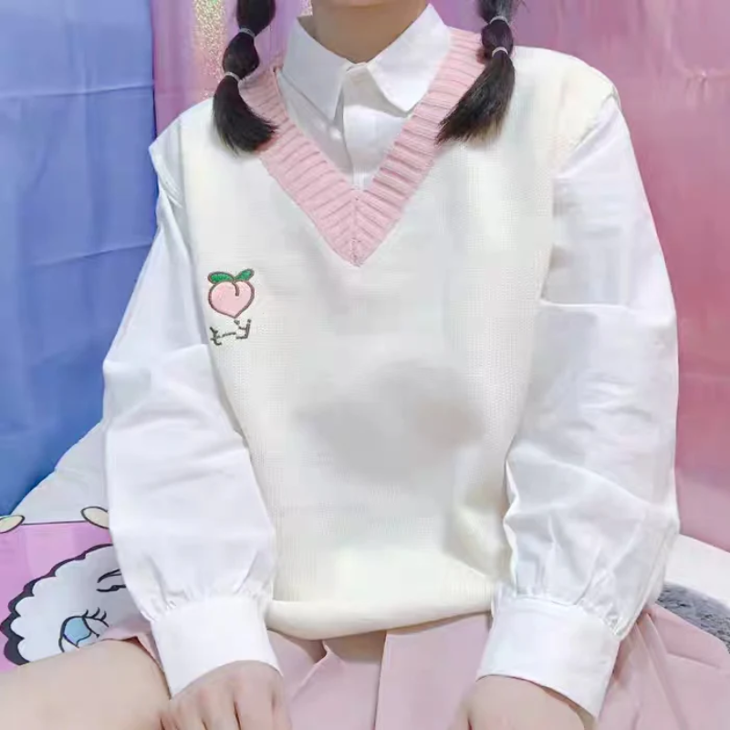 Kawaii Embroidery Fruits Knitted Vest in white, featuring cute embroidered fruits like a peach, adding a playful and charming touch.