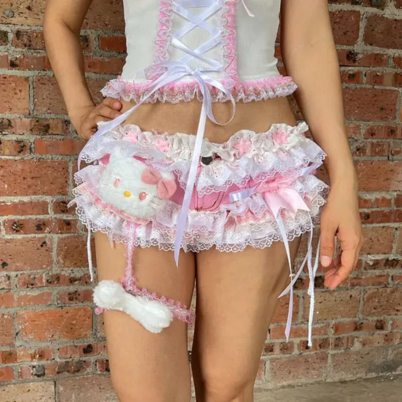 Kawaii Pink Kitten Micro Shorts detailed with cute ruffles, ribbons, and satin, adding a playful and sweet touch to your look.