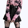 Kawaii Pink Knit Sweater with Bats and Hearts, in a pastel goth style, featuring long sleeves and a round collar for a cute yet edgy look.