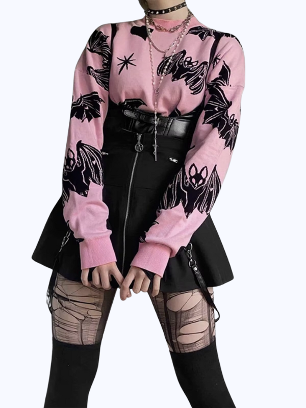 Kawaii Pink Knit Sweater with Bats and Hearts, in a pastel goth style, featuring long sleeves and a round collar for a cute yet edgy look.