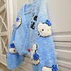 Cozy pastel blue cardigan with cute cat details