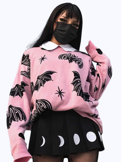 Pink Knit Sweater with Bats and Hearts, featuring a cute and spooky design for a perfect mix of kawaii and gothic style.