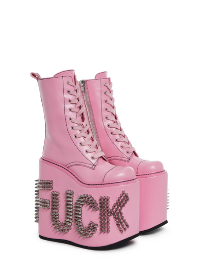 Pink Never Censored Platform Boots with pink laces and a side zipper, featuring chunky platform soles for a bold and stylish look.