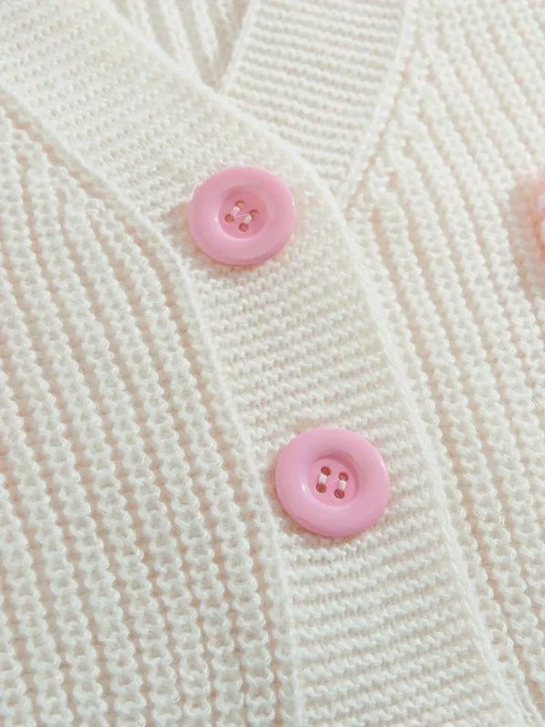Pastel pink soft girl cardigan with kawaii bow accents, warm and soft knit sweater, ideal for cute, cozy, and stylish outfits.