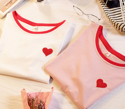 SweetLoveTee in white and pink, featuring a cute and soft design for a charming and comfortable look.