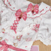 Sweet kawaii bow hairclips with plaid design and strawberry charm, sold as a pair.