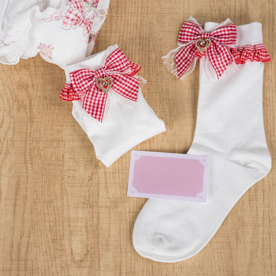 Mid-calf white socks with cute red plaid bow, kawaii fashion.