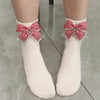 Soft girl Lolita socks with red plaid bow detail, ankle and mid-calf lengths.