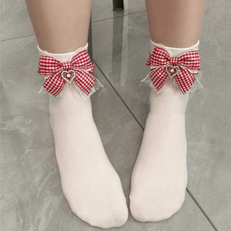 Soft girl Lolita socks with red plaid bow detail, ankle and mid-calf lengths.