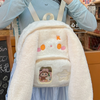 Beige bunny plush bag with large orange eyes, in Japanese kawaii style, bringing a cute and charming touch to your look.